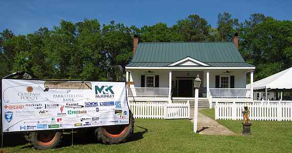 Sponsor banner outside home for Harrelson Center event